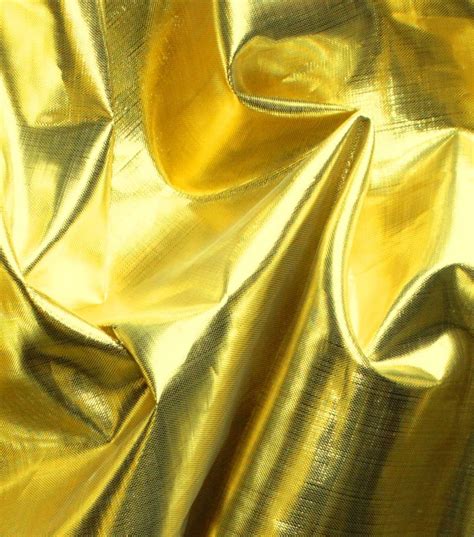 shiny metalic fabric|white fabric with gold metallic.